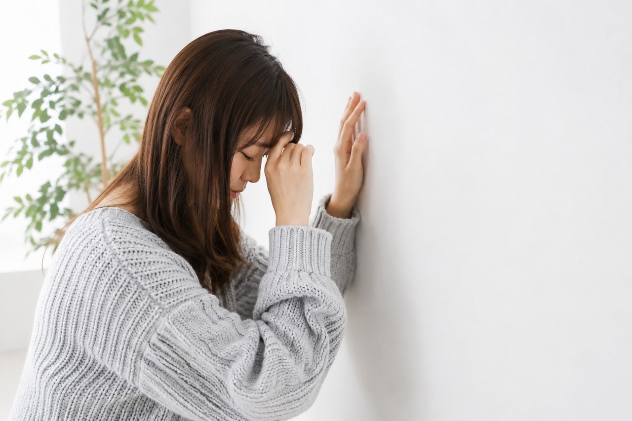 めまいがする女性